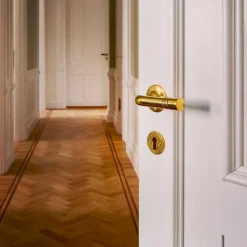 Dörrhandtag - Nationalteatern rund mässing